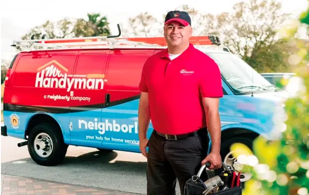 Mr. Handyman repairman greeting a Culver City, CA customer.
