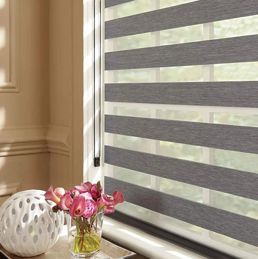 window shades and pink flowers