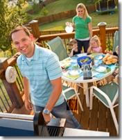 Family enjoying time on the deck after repairs are complete.