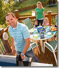 Family enjoying time on the deck after repairs are complete.