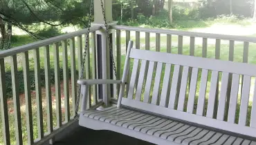 Porch swing on a porch
