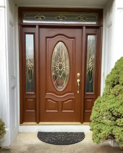 A residential front door refinished by Mr. Handyman of Metro East in Anderson.