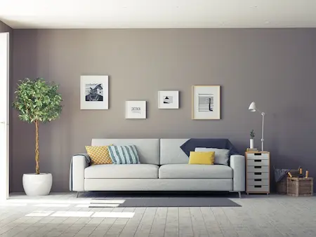 living room with framed pictures on wall