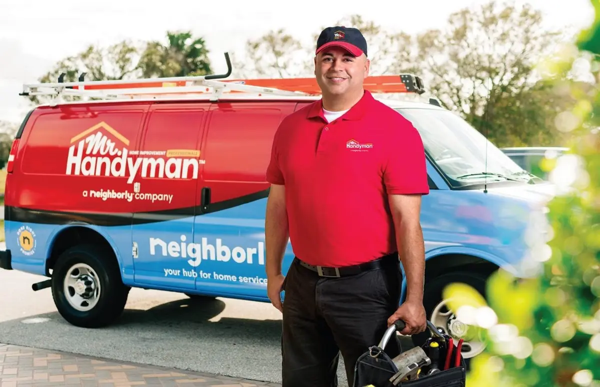 Mr. Handyman employee ready to perform commercial repairs.