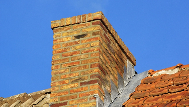 Brick chimney and sky above.