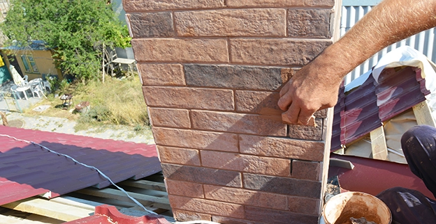 Repairing a chimney.