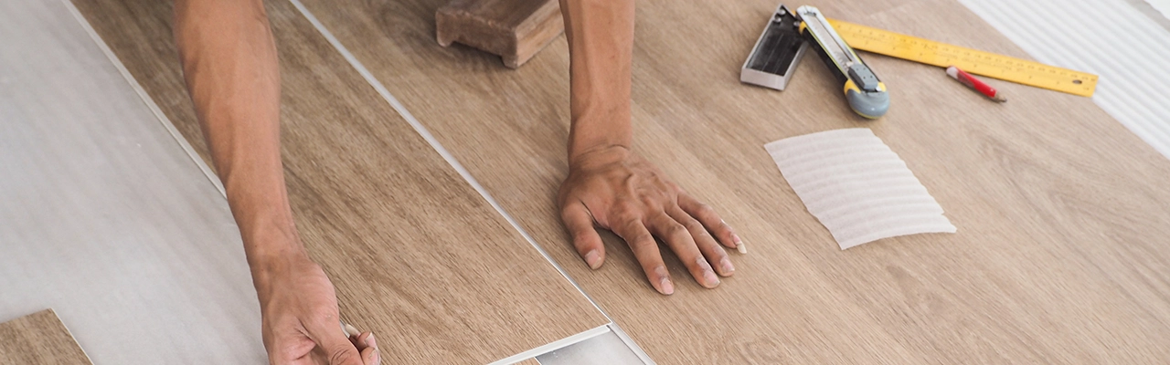 Installation of vinyl flooring.
