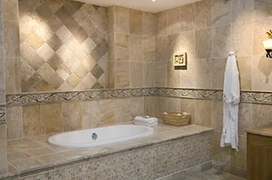 Tile wall in bathroom over sink.