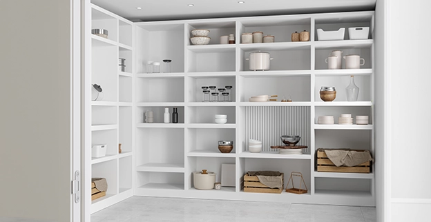 Shelves in a storage room with empty glass jars.