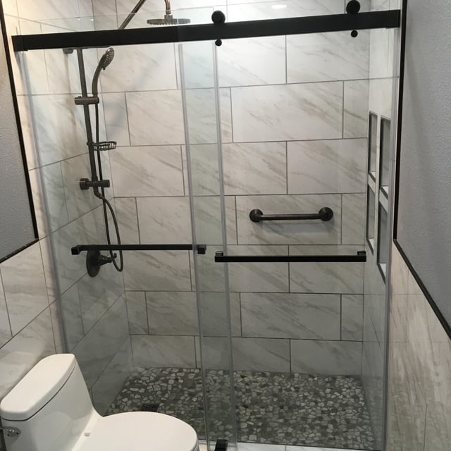Adding glass door to the shower space