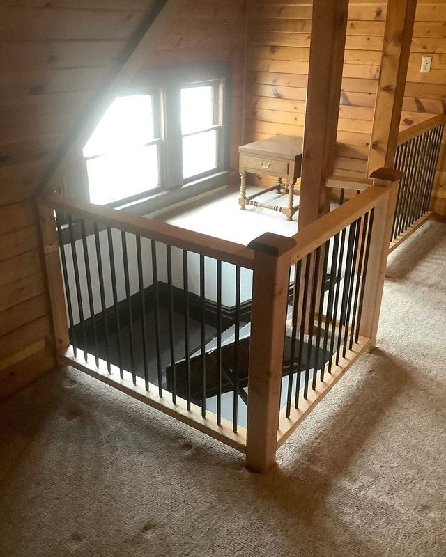 Attic stairs with a handrail