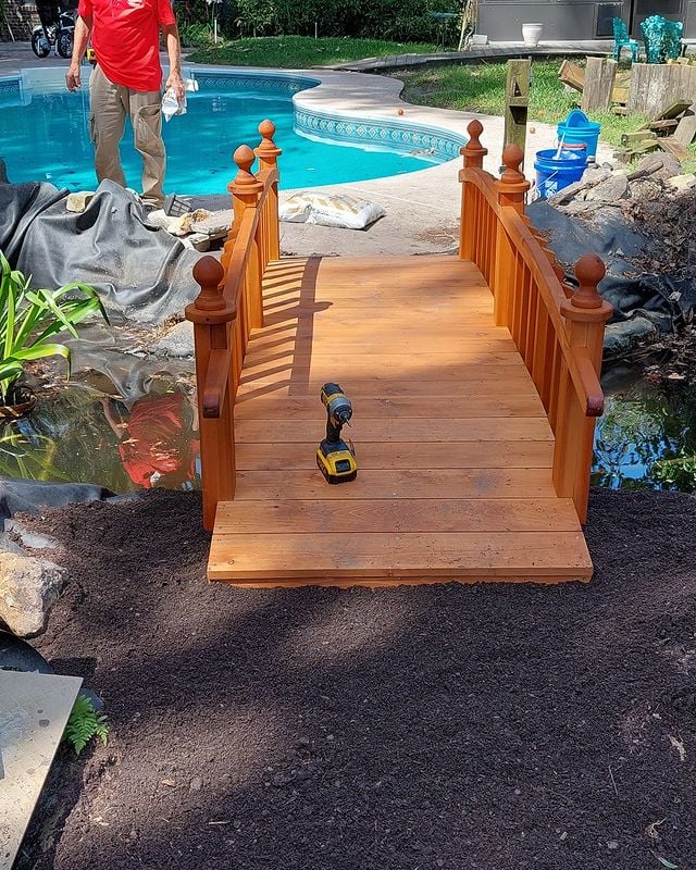 Bridge to make is easier to get from the yard to the pool.