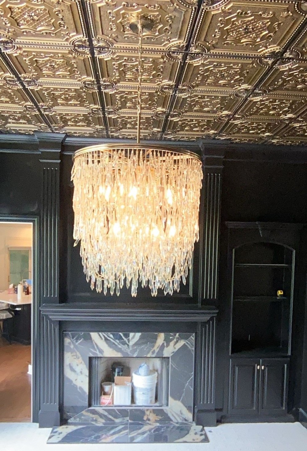 Chandelier & fireplace tile installation in Olathe