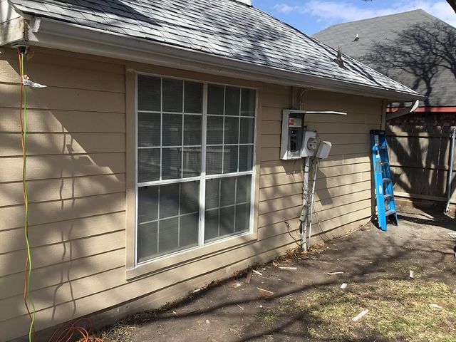 Exterior siding and window trim repair Arlington TX