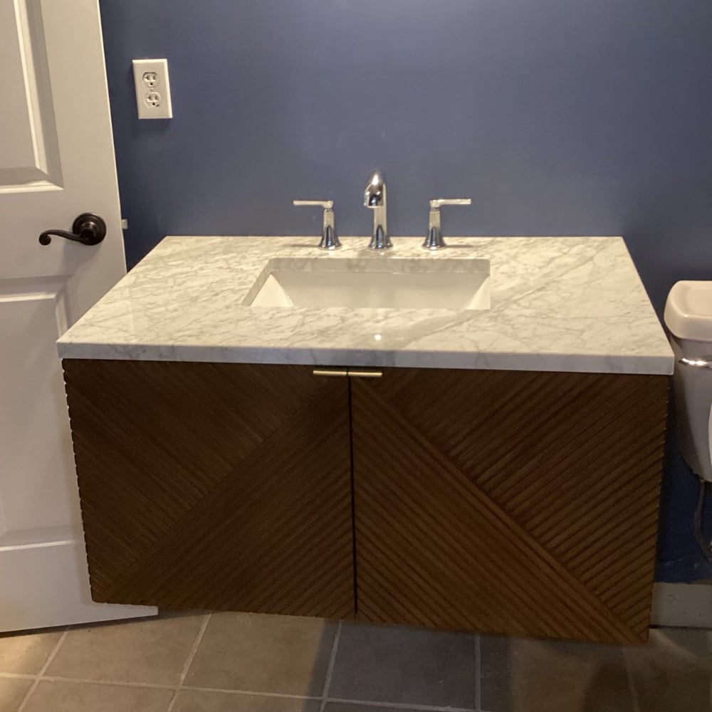 Floating Vanity installation in Leawood