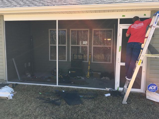 Screen porch installation.