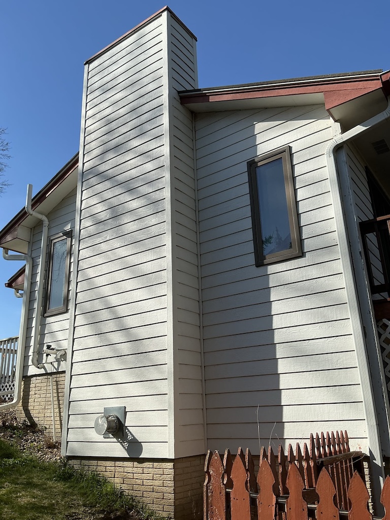 Exterior siding repair and restoration completed in Sioux Falls, SD by Mr. Handyman of Greater Sioux Falls.