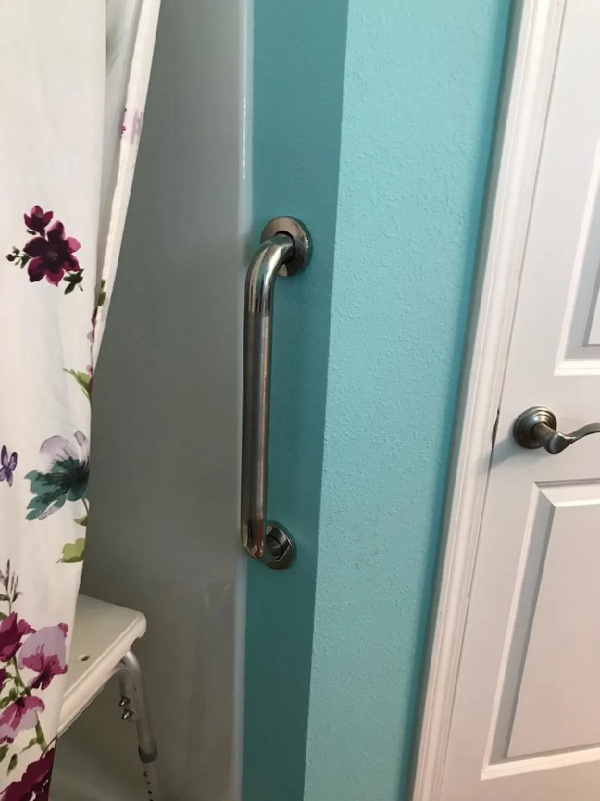A metal grab bar installed in a bathroom by a handyman in Granite City, IL.