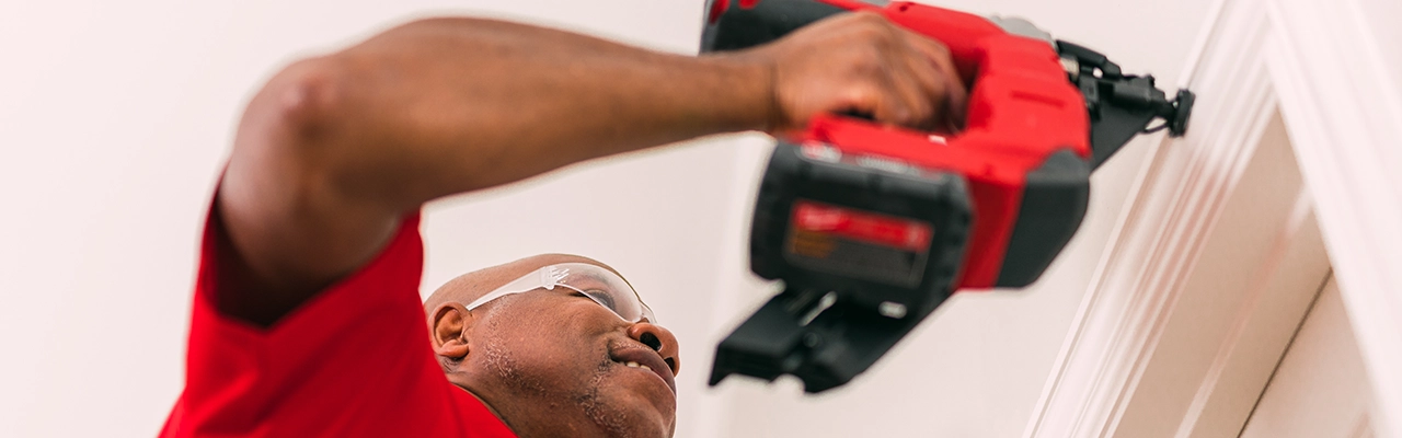 Decorative molding around a door frame.