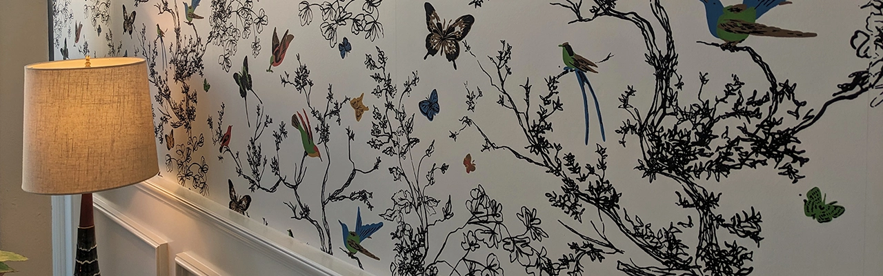 Decorative wallpaper on interior wall.