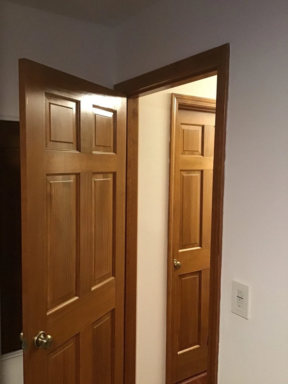 A wooden door installed in a home with Mr. Handyman’s services for door installation in Collinsville, IL.