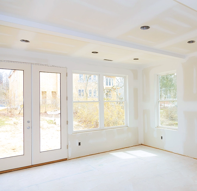 Unfinished room with white wall.