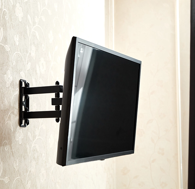 A flat-screen TV mounted on a wall.