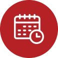 Flat red circular icon containing a white monthly calendar page with a small clock symbol in the lower-right corner.