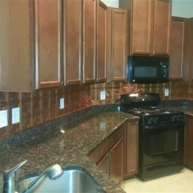 A kitchen remodel involving new cabinet installation completed by Mr. Handyman.