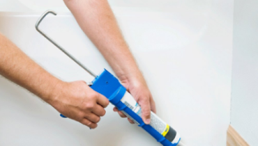 How do I know if I should use silicone or acrylic latex caulk?