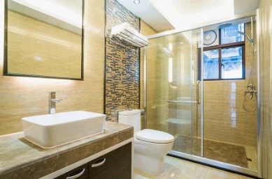 Elegant stone bathroom with walk-in shower.