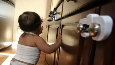 Baby grabbing cabinet doors