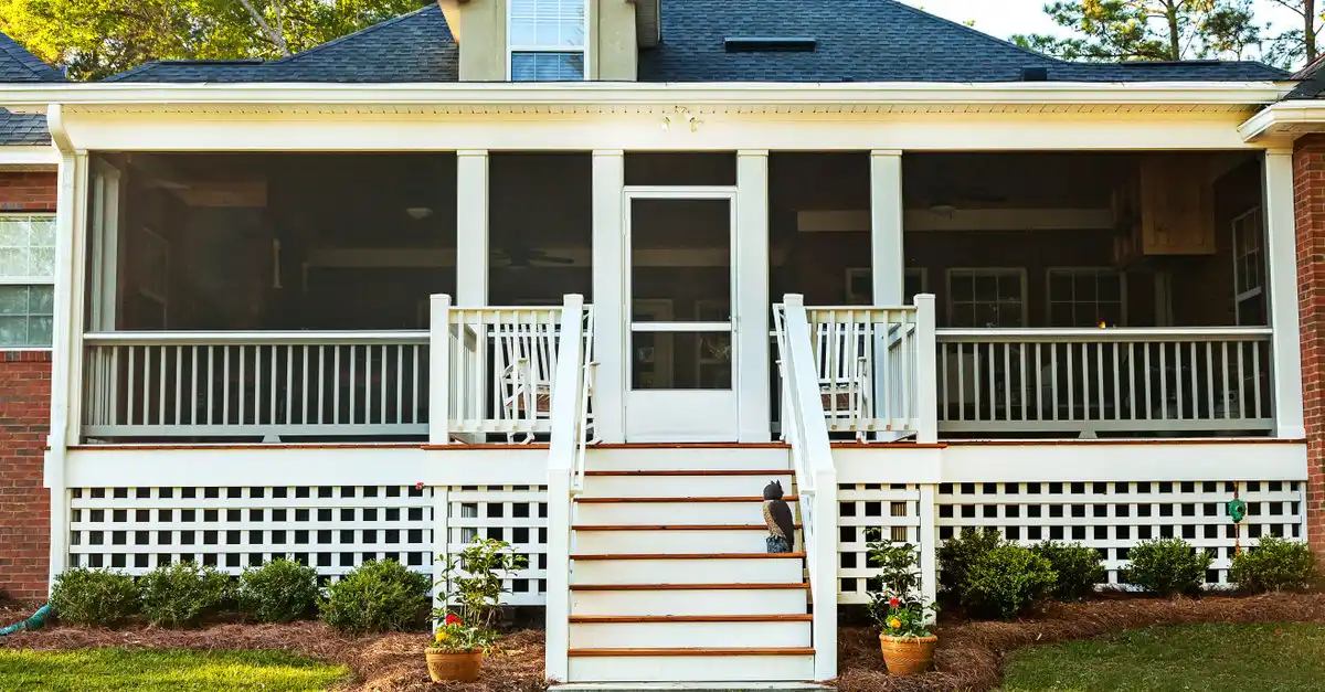 A screened-in porch that has been well maintained with porch repairs to keep it safe and functional.