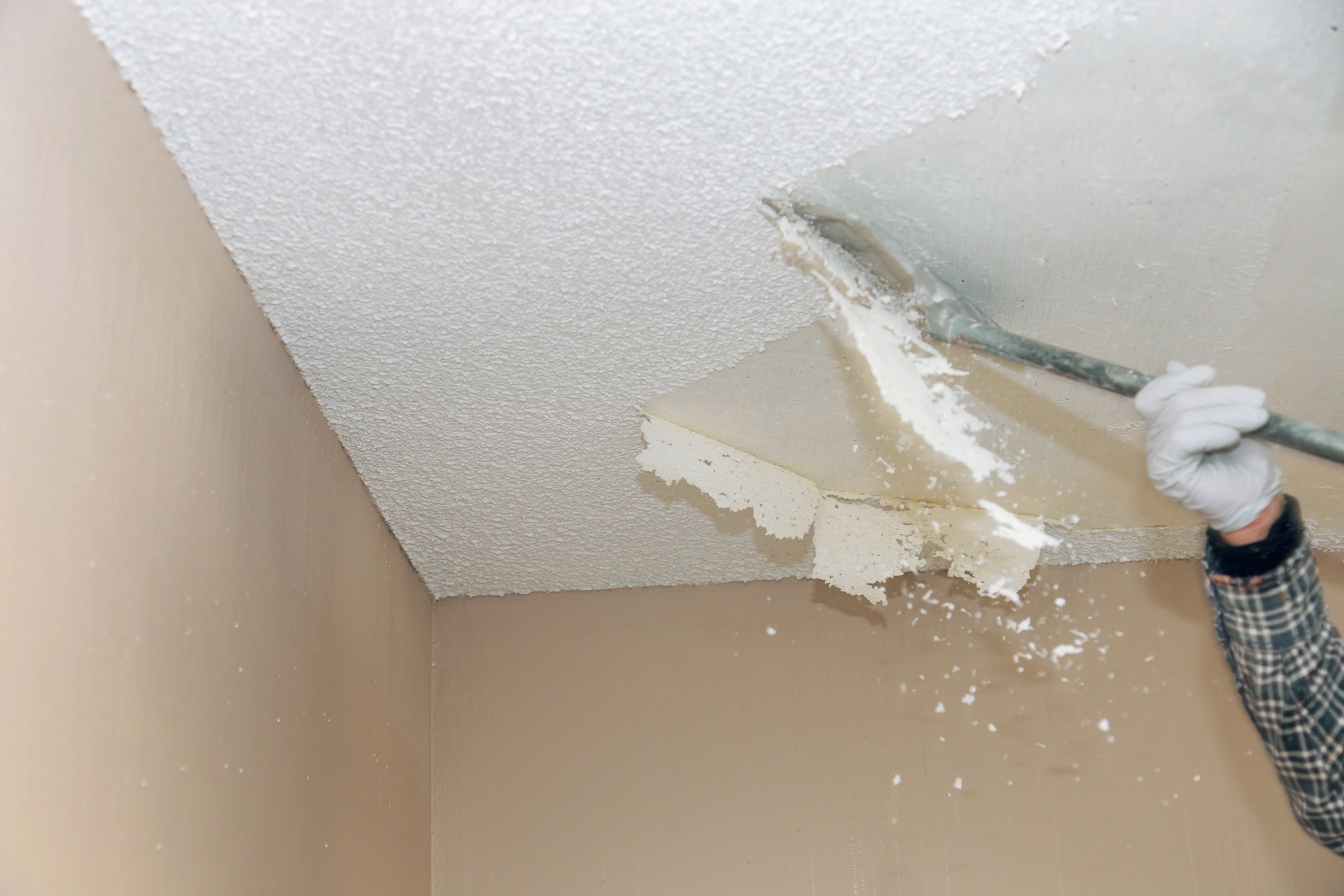 Popcorn ceiling being removed