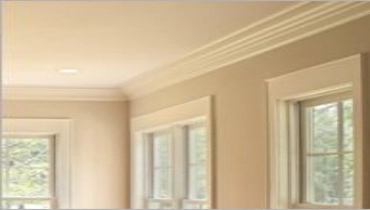 Installing crown moulding.