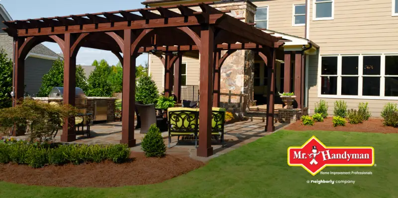 backyard patio cover with green lawn