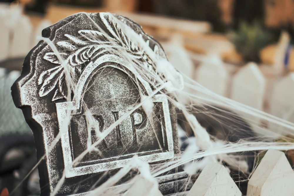 DIY spider web tombstone halloween decoration. 