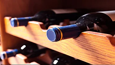 wine in wooden wine rack