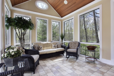 Beautiful sunroom with large windows in a residential home