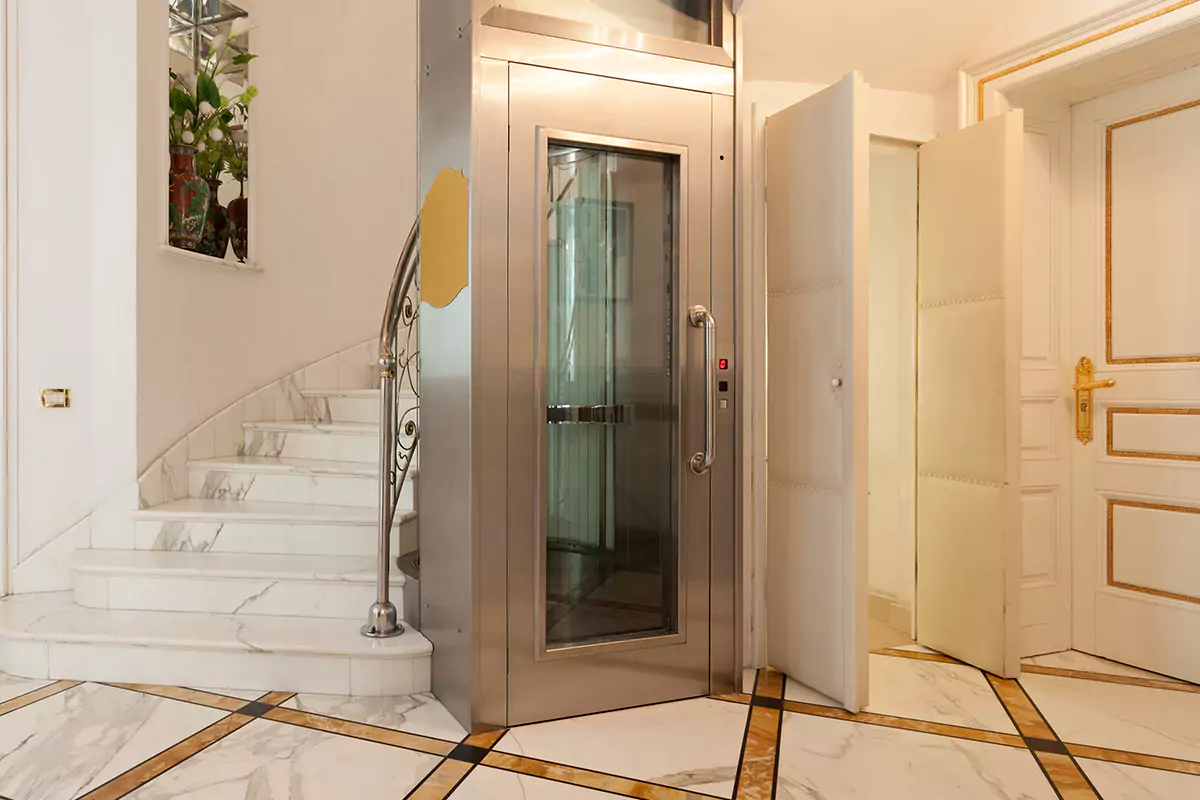 A residential stair lift installed inside of a multistory home.