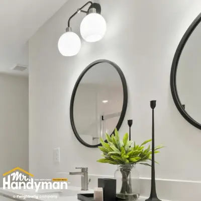White double bathroom vanity install.