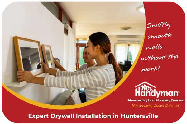 Young woman decorating a room after having the drywall fixed.