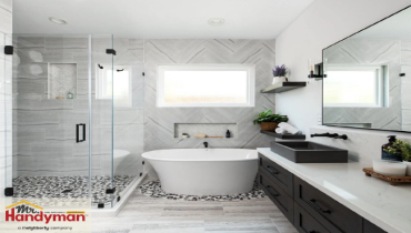 Modern bathroom featuring refinished bathtub and updated fixtures in Elkhart County home