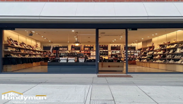 Store interior viewed through a large glass window.