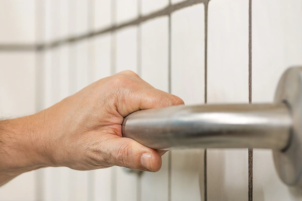 Grab bar installation for accessibility.