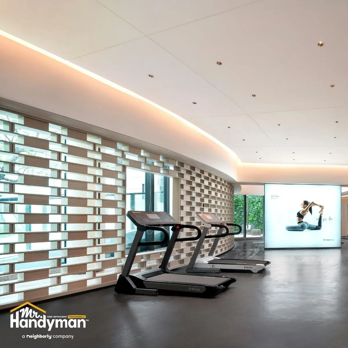 Modern gym interior with two treadmills.