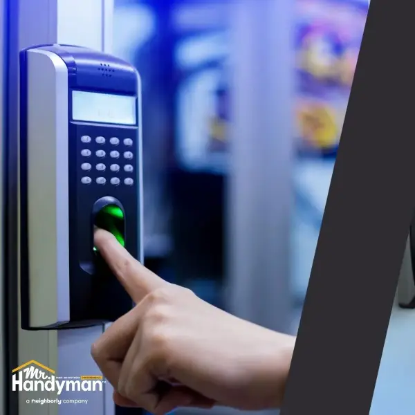 Mr. Handyman technician servicing commercial door hardware 