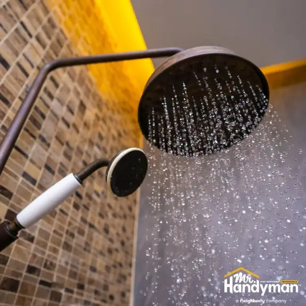 Mr. Handyman shower fixture upgrade.