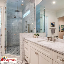 Modern bright bathroom with marble countertop.