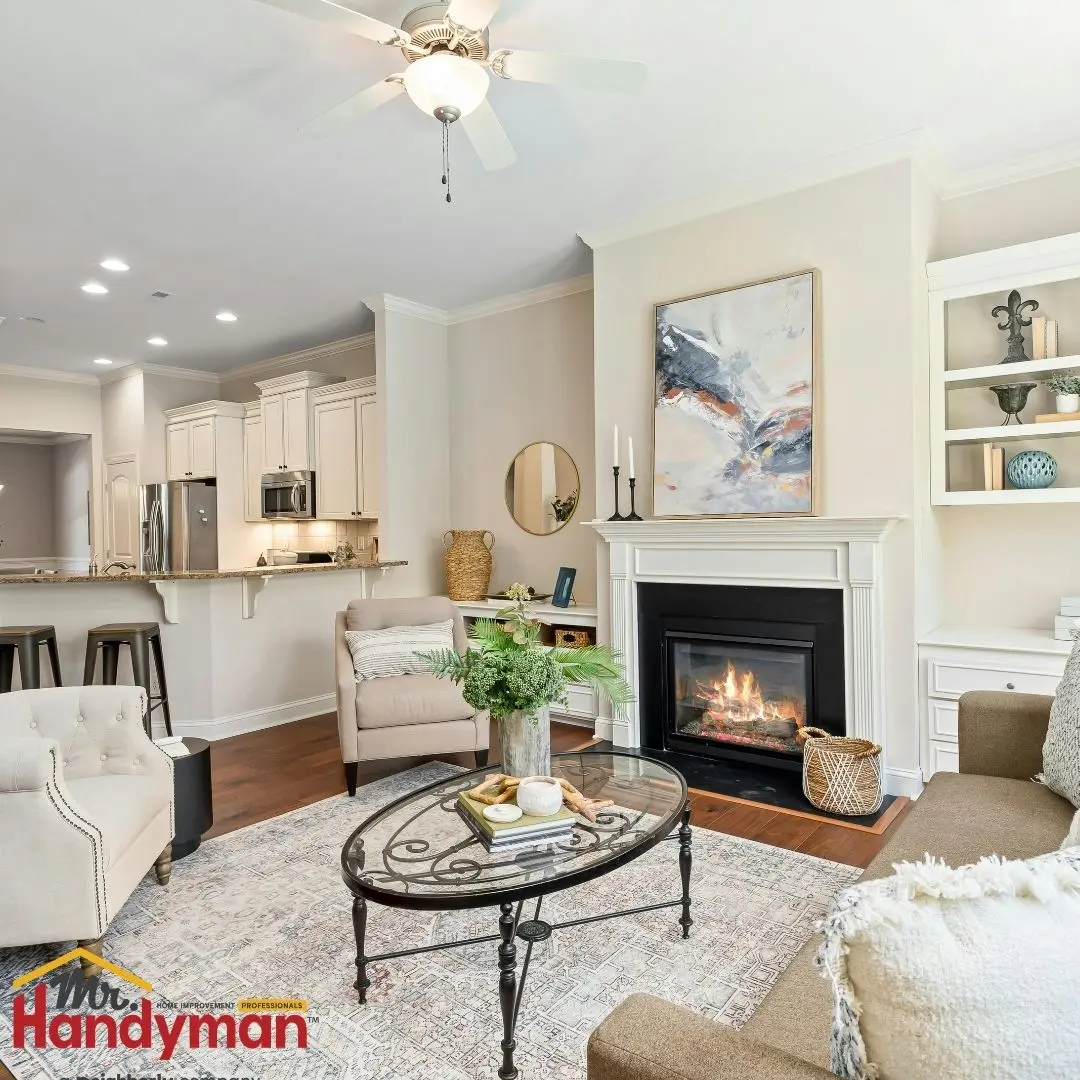 Living room with a fireplace, coffee table, and cozy seating.